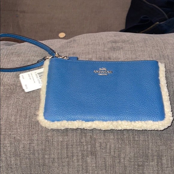 Coach Handbags - NWT Bright Blue Coach Wristlet